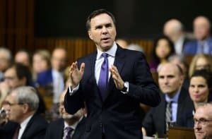 Minister of Finance Bill Morneau stands during Question Period in the House of Commons on Parliament Hill in Ottawa on Tuesday, Feb. 5, 2019.